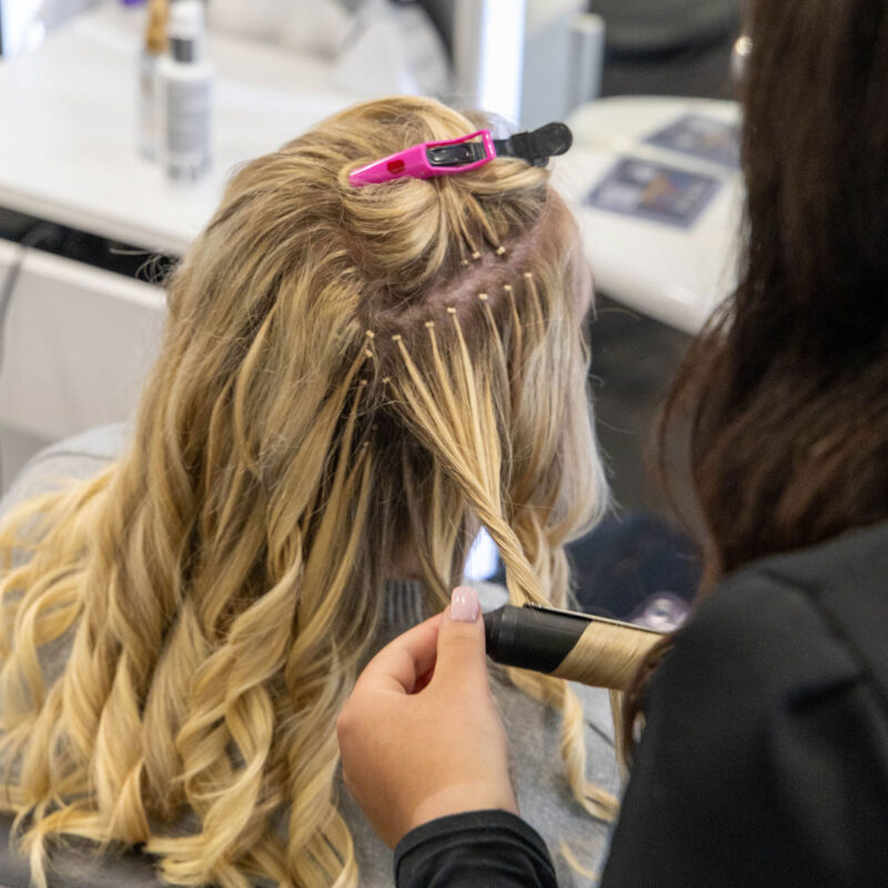 Micro ring hair extensions being styled at Unique Hairdressing in Bishop's Stortford.